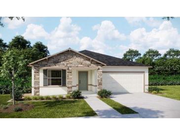 Charming single-Gathering home with stone accents and a well-manicured lawn at 4906 Lyric Dr, Mascotte, FL 34753