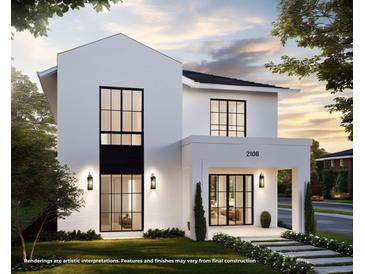Modern two-story home with a white facade, black-framed windows, manicured landscaping, and a welcoming entrance at 2102 S Osceola Ave, Orlando, FL 32806