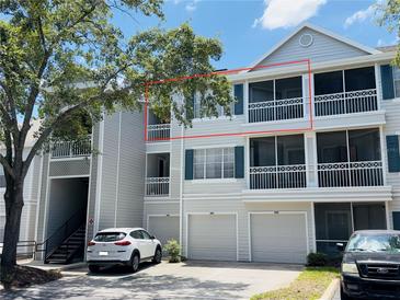 Exterior view of the condo building showcasing balconies at 5017 City St # 1932, Orlando, FL 32839
