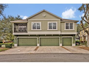 Charming townhome with three car garage and a balcony, perfect for enjoying the outdoors at 466 Ashley Brooke Ct # C, Apopka, FL 32712