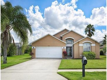 Charming single-Gathering home with a well-manicured lawn and a two-car garage at 7952 Heritage Entrance Blvd, Kissimmee, FL 34747