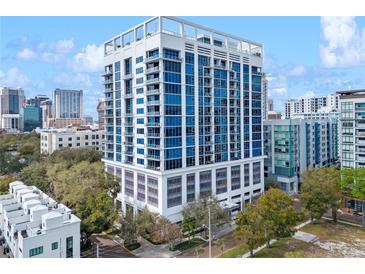 Modern high-rise condo building with expansive windows and balconies, offering stunning city views at 260 S Osceola Ave # 601, Orlando, FL 32801