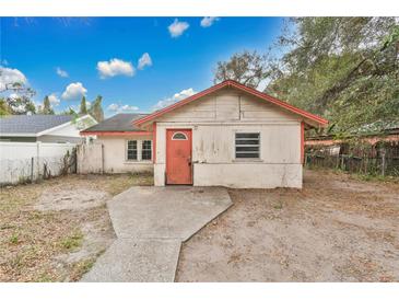 Exterior view of a small home featuring a quaint design and compact yard space at 1014 24Th St, Orlando, FL 32805