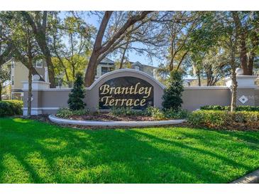 Brantley Terrace community sign surrounded by manicured landscaping and mature trees at 584 Brantley Terrace Way # 209, Altamonte Springs, FL 32714