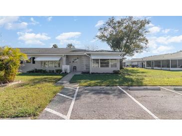 Charming single-story home with well-maintained lawn and parking spaces in a quiet neighborhood at 1417 High Point Blvd # 150D, Orlando, FL 32825