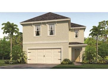 Charming two-story home featuring a two-car garage and tropical landscaping at 3013 Moulin Rd, Davenport, FL 33837