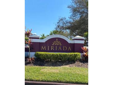 The Mirada community sign features lush landscaping and a decorative entrance at 2025 Dixie Belle Dr # 2025, Orlando, FL 32812