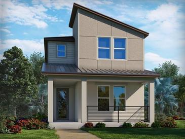 Modern two-story home with neutral tones, a welcoming front porch, and manicured landscaping at 5106 Railroad Vine Aly, Winter Garden, FL 34787
