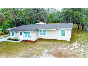Charming single-story home featuring a newer roof, updated windows and a freshly painted exterior at 5390 E Hinson Ave, Haines City, FL 33844