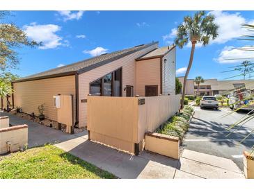 Charming condo with desert landscaping, lovely sky, and well-maintained exterior at 2447 Ne 7Th St, Ocala, FL 34470