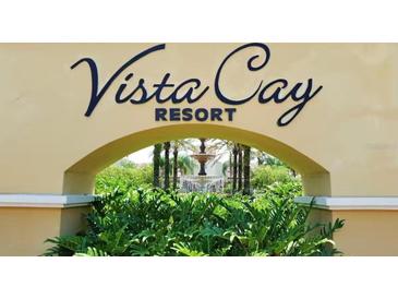 Vista Cay resort sign with lush greenery and a fountain visible in the background at 5000 Cayview Ave # 10108, Orlando, FL 32819