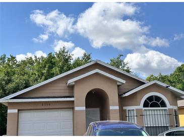 Charming single-Gathering home with a well-maintained yard and inviting curb appeal at 4954 Luna Negra Dr, Orlando, FL 32811