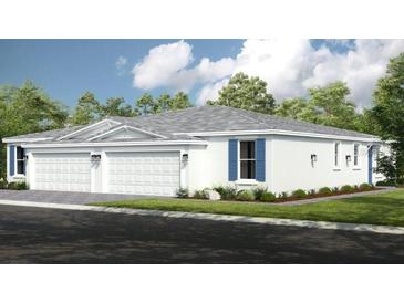 Charming single-story home with white exterior, blue shutters, and a well-manicured lawn at 5352 Spoonflower Ct, St Cloud, FL 34771