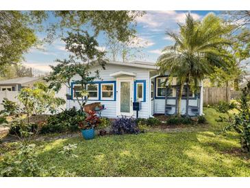 Beautiful home exterior with well-maintained landscaping, enhancing curb appeal at 430 E Crystal Lake St, Orlando, FL 32806
