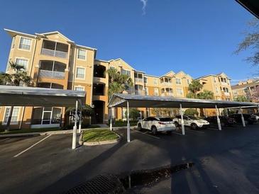 Spacious condo complex provides covered parking and beautiful architecture at 6451 Old Park Ln # 302, Orlando, FL 32835