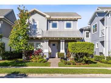 Charming two-story home with a well-manicured lawn and inviting front entrance at 13800 Chauvin Ave, Orlando, FL 32827