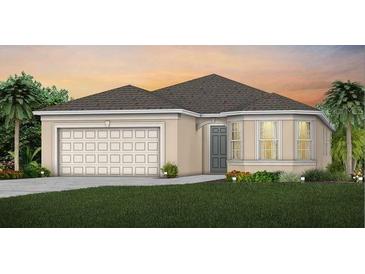 Charming single-story home features a two-car garage, well-manicured lawn and beautiful sunset views at 1887 Groveline Rd, St Cloud, FL 34771