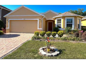 Charming single-Gathering home with manicured lawn and inviting curb appeal at 3823 Ryegrass St, Clermont, FL 34714