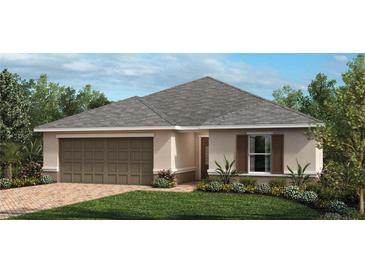 Charming single-story home featuring a two-car garage and well-manicured landscaping at 3381 Sanctuary Dr, Clermont, FL 34714