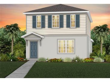 Charming two-story home with blue shutters and tropical landscaping at sunset at 3371 Vine Leaf St, Apopka, FL 32712