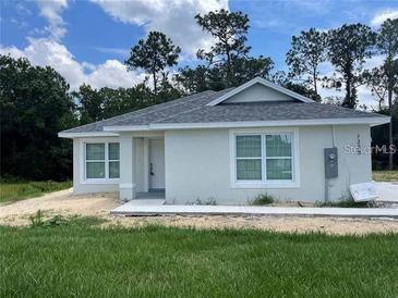 Charming single-Gathering home with a well-maintained lawn, ready for new owners in a quiet neighborhood at 1328 Burnley Ct, Kissimmee, FL 34758