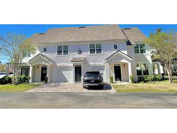 Charming two-story townhome with attached garage and inviting curb appeal in a desirable neighborhood at 3291 Westchester Square Blvd # 203, Orlando, FL 32835