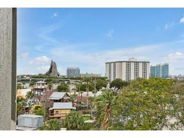 Expansive city view featuring buildings and landscaping under a blue sky at 6165 Carrier Dr # 3701, Orlando, FL 32819
