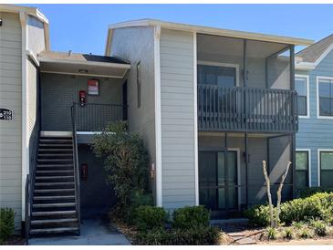 Condo with stairs, balconies, and greenery; perfect for relaxed living at 3772 Idlebrook Cir # 210, Casselberry, FL 32707