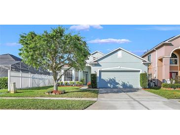 Charming single-Gathering home featuring a well-manicured lawn, mature trees, and a two-car garage at 1318 Horizon Creek Ct, Orlando, FL 32828