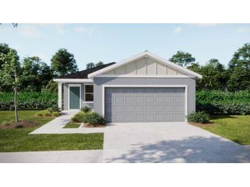 Charming one-story home with a two-car garage and well-maintained landscaping at 2775 San Marco Way, Winter Haven, FL 33884