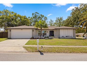 Charming single-story home with a well-manicured lawn and a classic design at 520 Balsawood Ct, Altamonte Springs, FL 32714