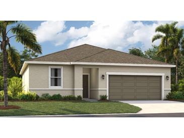 Charming single-story home featuring a neutral color scheme, a two-car garage, and a well-maintained lawn with tropical landscaping at 1718 Blue Lagoon Cir, Mascotte, FL 34753