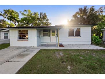 Charming single-story home featuring a well-kept lawn and a classic front entrance at 241 S Marydell Ave, Deland, FL 32720