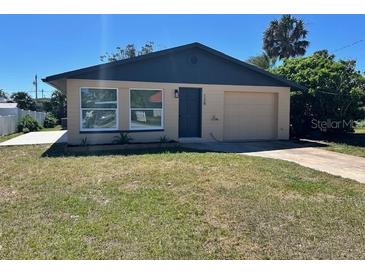 Charming single-story home with a well-maintained lawn and inviting curb appeal at 124 Harrison Rd, Daytona Beach, FL 32118