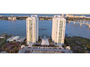 Stunning aerial view of waterfront condos and city skyline, showcasing prime real estate at 231 Riverside Dr # 708, Daytona Beach, FL 32117
