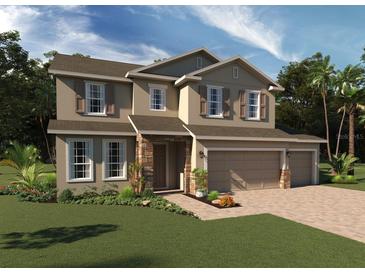 Charming two-story home with a two-car garage, well-manicured lawn, and beautiful landscaping at 5915 Sierra Crown St, Mount Dora, FL 32757
