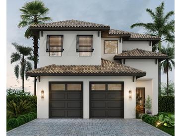 Charming two-story home featuring a neutral color palette, decorative windows, and an attached two car garage at 16048 Trivoli Cir, Bella Collina, FL 34756