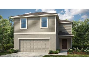 Two-story home with neutral siding, a two-car garage, and neatly landscaped shrubbery at 326 Wayland Dr, Haines City, FL 33844