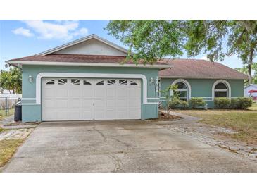 Charming single-story home featuring a two-car garage and well-maintained landscaping at 2622 Jennifer Dr, Lakeland, FL 33810
