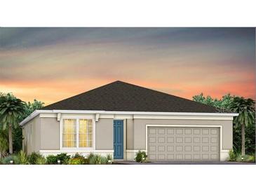 Charming single-story home with a two-car garage and landscaped front yard at sunset at 5517 Flame Vine Way, St Cloud, FL 34771