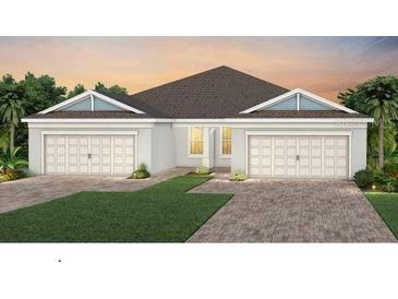Charming single-story home with a two-car garage and well-manicured lawn at 5166 Gardenrow Dr, St Cloud, FL 34772