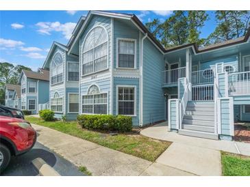 Charming two-story condo with a private entrance and well-maintained landscaping at 2047 Royal Bay Blvd # 21, Kissimmee, FL 34746