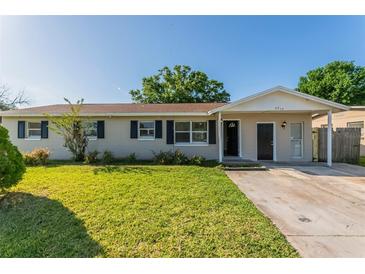 Charming single-story home with a well-maintained lawn and neutral exterior paint at 5379 Botany Ct, Orlando, FL 32811