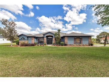 Charming single story home with mature landscaping and stone accents create curb appeal at 4037 Se 40Th St, Ocala, FL 34480
