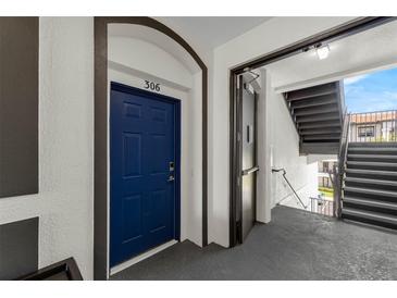 Unit 306 features a secure entry door and convenient stair access at 4102 Breakview Dr # 30603, Orlando, FL 32819