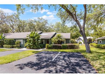 Charming single-story home with mature landscaping and designated parking at 622 Mount Homer Rd # 622, Eustis, FL 32726