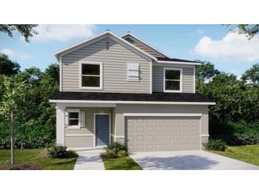 Charming two-story home featuring a two-car garage, landscaped yard, and a blend of modern design at 2799 San Marco Way, Winter Haven, FL 33884