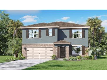 Charming two-story home with stone accents, shutters, attached garage, and lush landscaping at 33609 Seattle Slew Dr, Sorrento, FL 32776