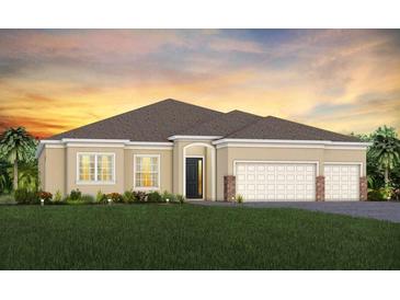 Beautiful one-story home with a three-car garage and manicured lawn at 4619 Flagstaff Ct, Orlando, FL 32820