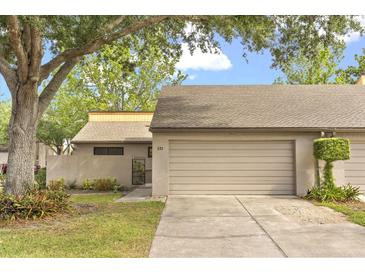 Charming single-Gathering home featuring a two-car garage and well-maintained front yard at 121 Teriwood St, Fern Park, FL 32730